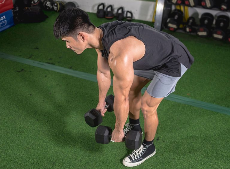 A,Fit,Asian,Man,Does,Romanian,Dumbbell,Deadlifts,Or,Bent