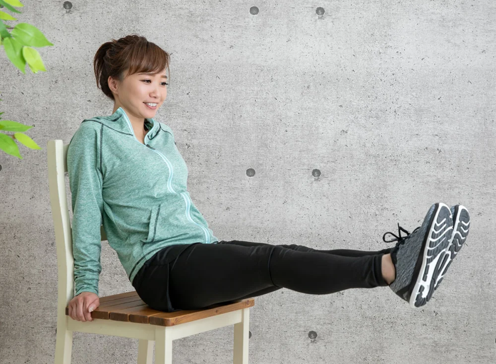 The,Woman,Who,Trains,Using,A,Chair