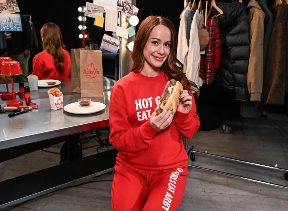 Whitney Leavitt Gets into Character with Arby’s New Italian Beef Sandwich in New York City