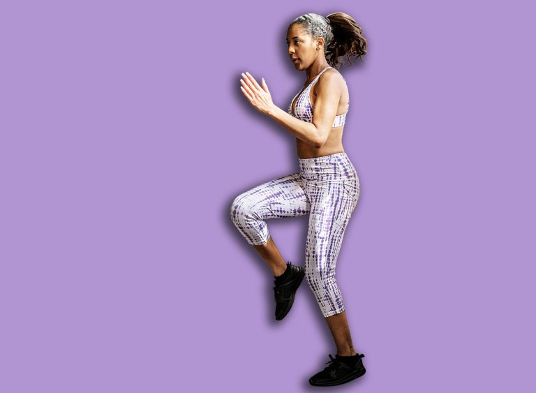 Sportive,Woman,Doing,A,High,Knees