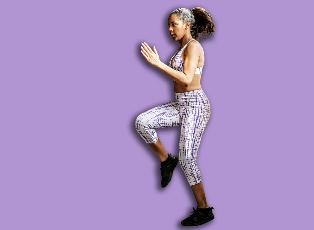 Sportive,Woman,Doing,A,High,Knees