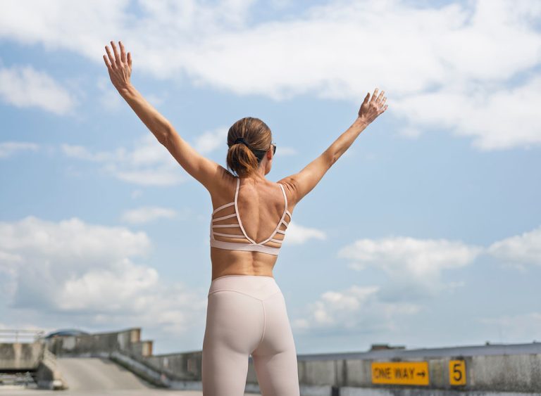 Fit,Sporty,Woman,With,Arms,Raised,Outdoors,,Freedom,Concept