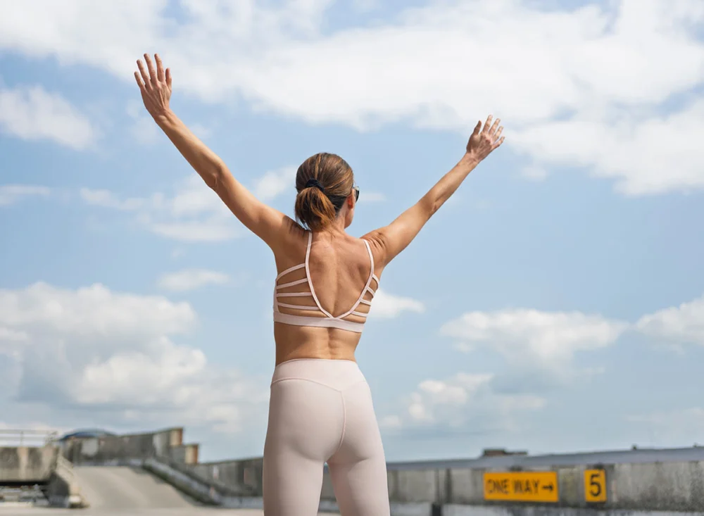 Fit,Sporty,Woman,With,Arms,Raised,Outdoors,,Freedom,Concept