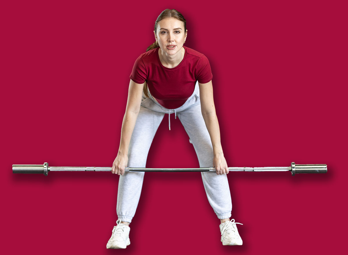 Athletic,Woman,Lifting,A,Barbell.,Client,Of,The,Gym,At