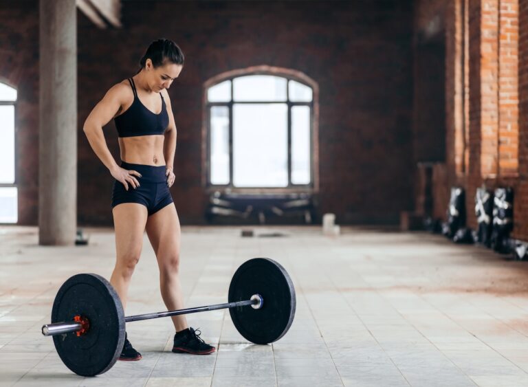 Tired,Beautiful,Young,Woman,With,Hands,On,The,Hips,Resting