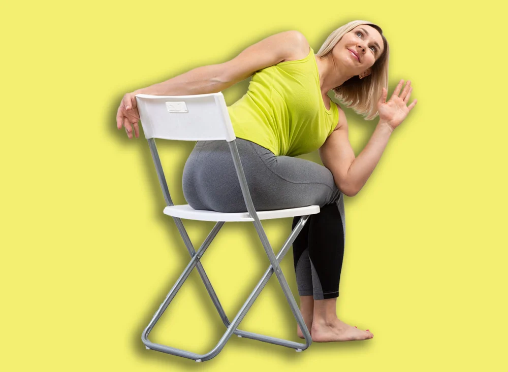 Yoga,With,A,Chair.,Adult,Caucasian,Woman,Sits,And,Practice