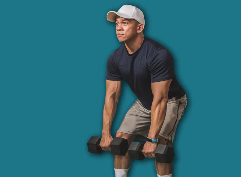 A,Fit,Man,And,His,Protege,Does,Dumbbell,Romanian,Deadlifts