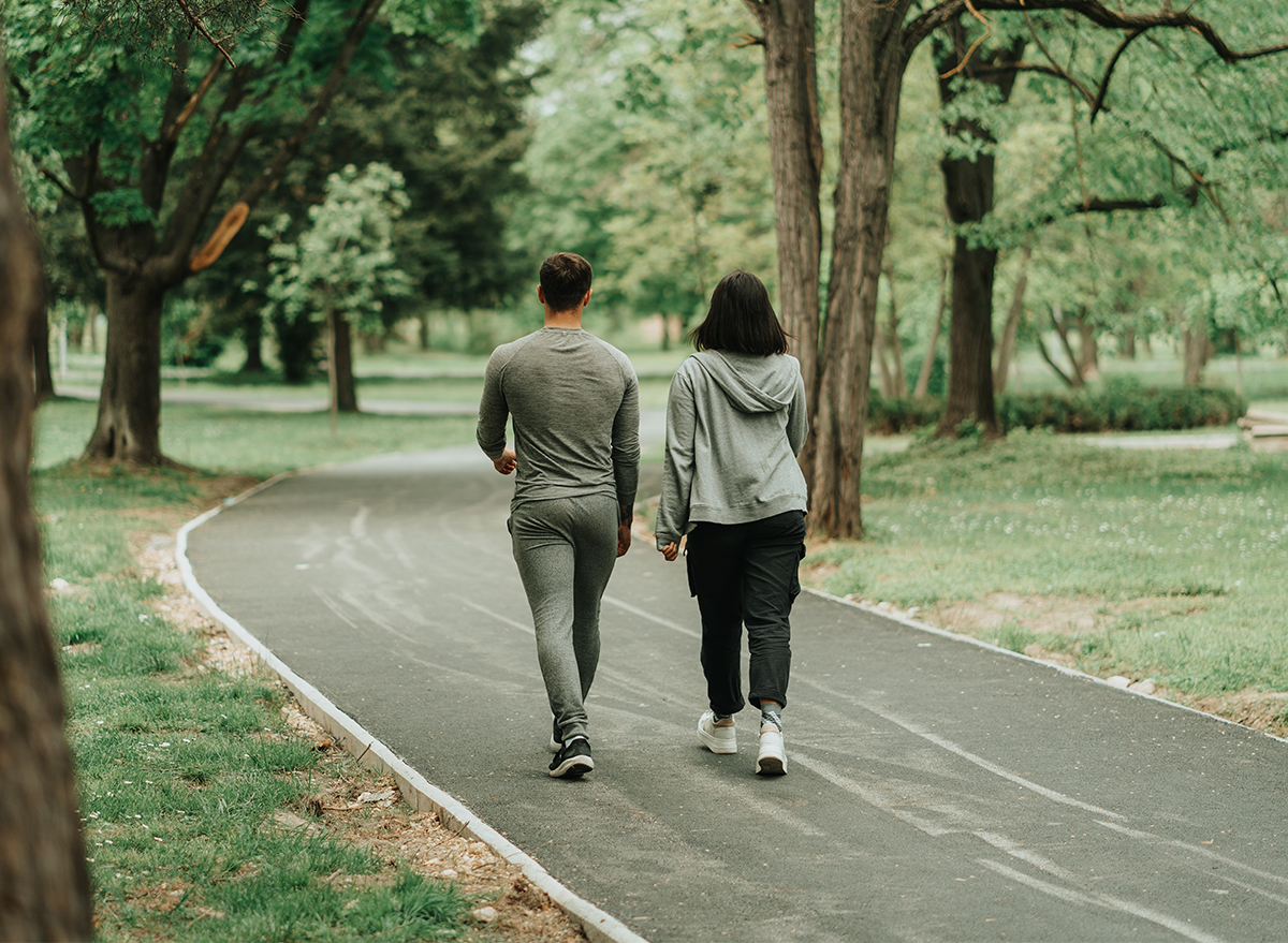 Sport,Couple,Walking,On,The,Path,In,The,Park