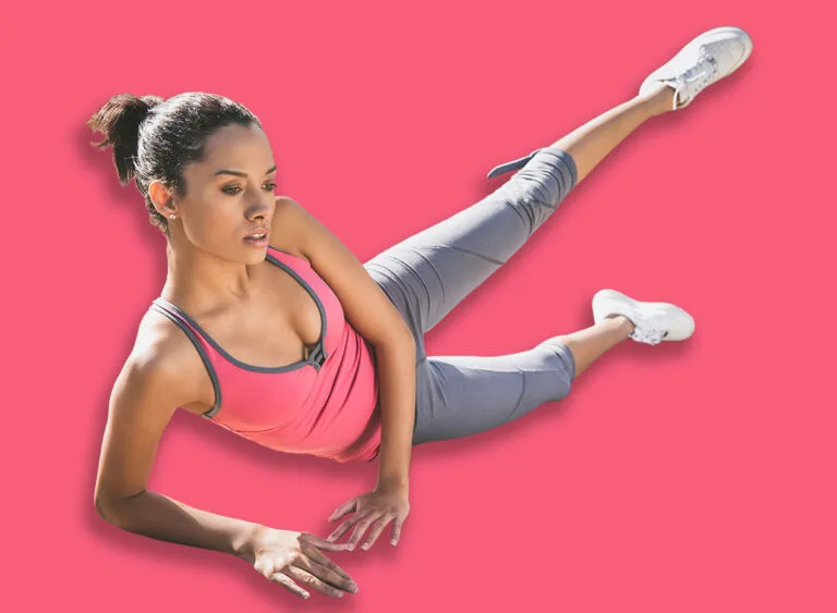 Woman,Lying,On,Side,On,Decking,,Leg,Raised,Exercising