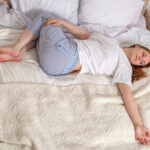 Woman,Doing,Exercises,In,Bed,At,Home,In,The,Morning.