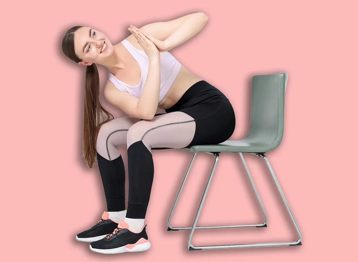 Beautiful,Woman,Stretching,On,Chair,At,Home