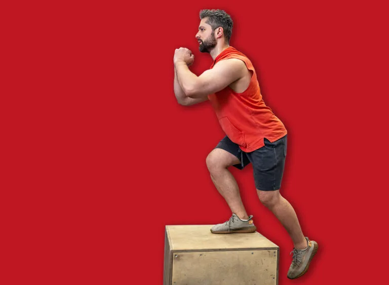 Man,In,Sportswear,Doing,Step,Up,Workout,With,Wooden,Box