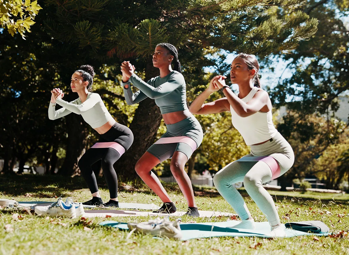Women,,Squat,Or,Yoga,Class,With,Pilates,In,Nature,For
