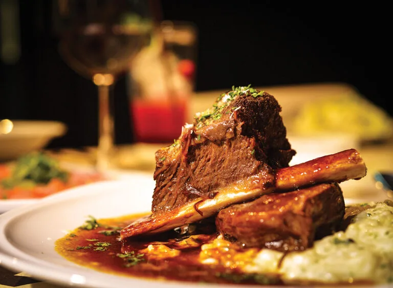 Close,Up,Of,Braised,Beef,Short,Rib,On,Dinner,Table.
