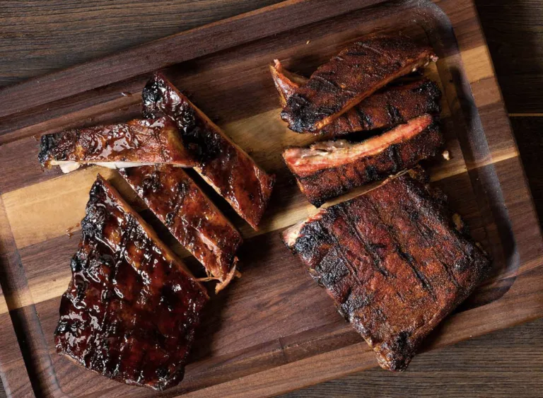 unveiling-authentic-barbecue-national-eateries-upholding-traditional-hickory-smoking-techniques-for-superior-rib-flavor