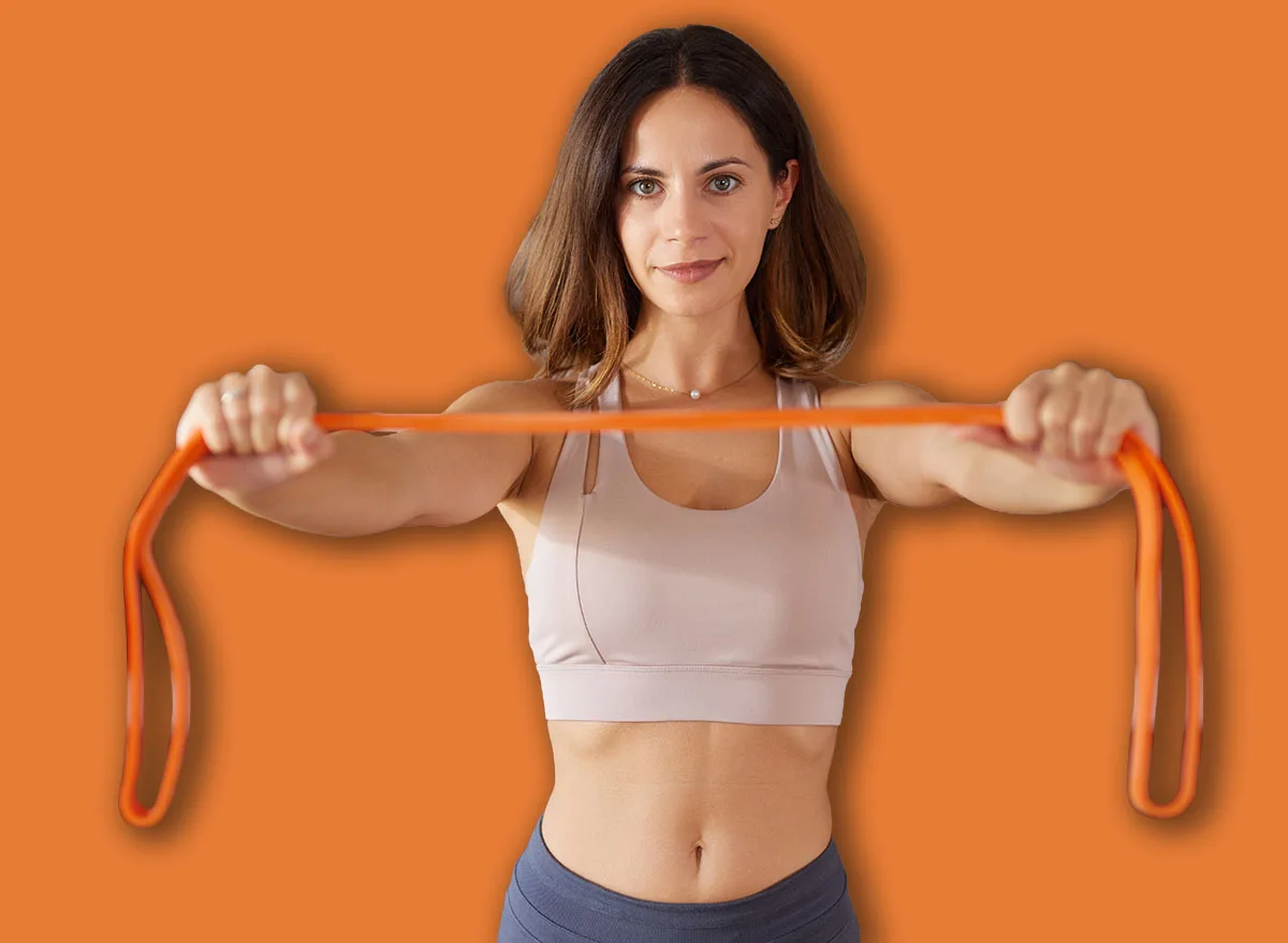 A,Woman,Is,Performing,A,Home,Workout,Using,A,Resistance