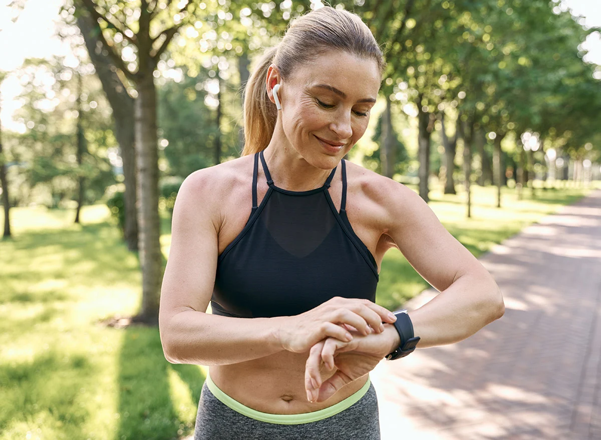 Morning,Jog.,Beautiful,Sporty,Woman,In,Sportswear,And,Earphones,Looking