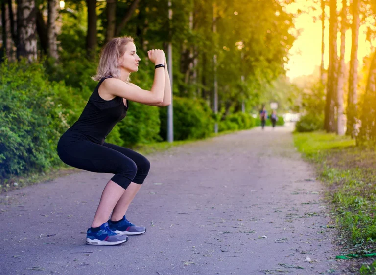 Girl,Squatting.,Healthy,Lifestyle.,Exercises.,Sports,In,The,Fresh,Air.