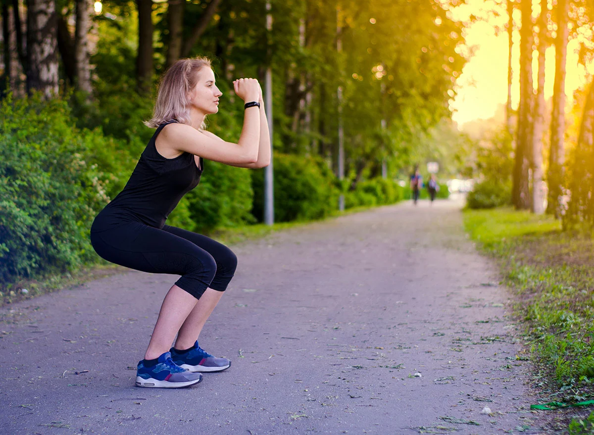 Girl,Squatting.,Healthy,Lifestyle.,Exercises.,Sports,In,The,Fresh,Air.