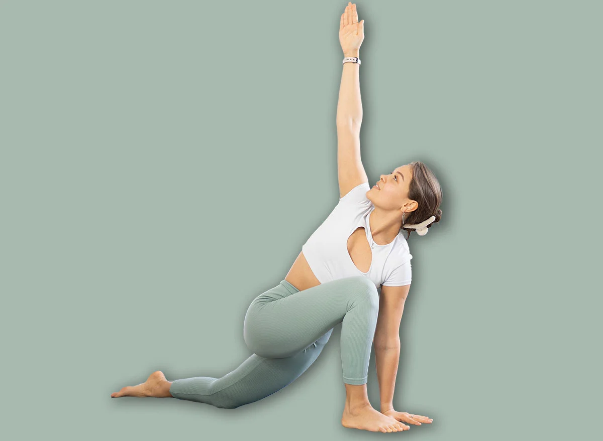 Positive,Young,Girl,With,Group,Of,Female,Yoga,Enthusiasts,Performing