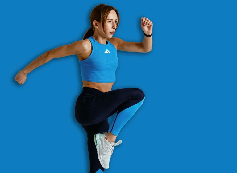 Athletic,Active,Fitness,Woman,Jumping,On,Studio,Background,.,Dynamic