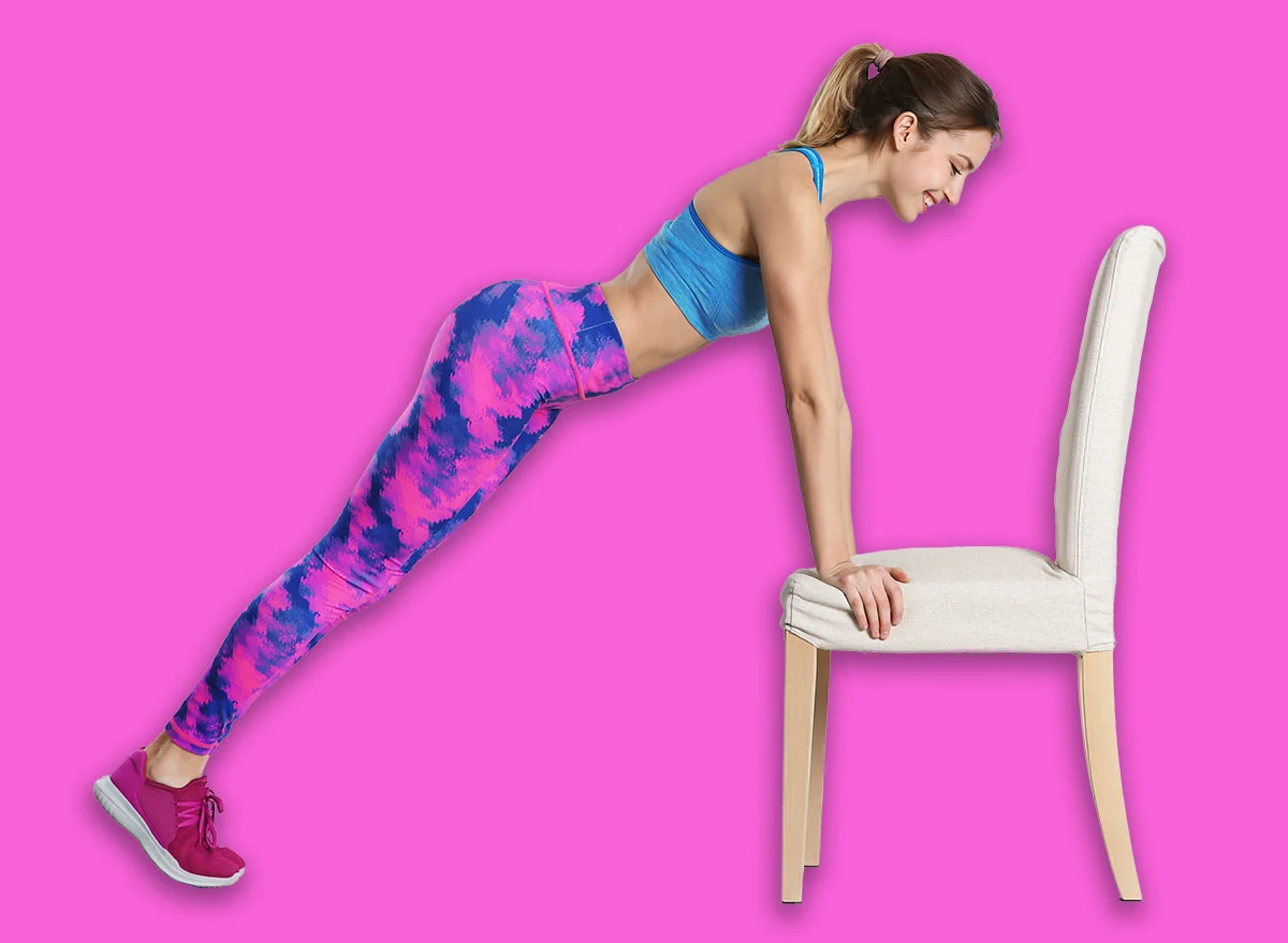 Young,Woman,Exercising,With,Chair,Near,White,Wall.,Home,Fitness