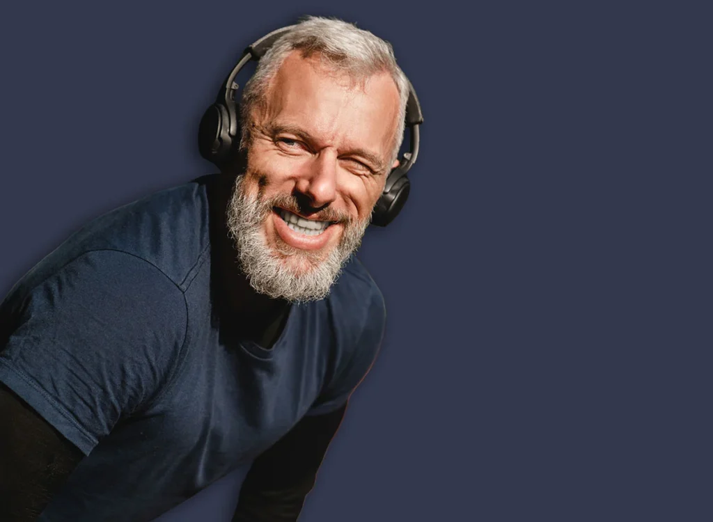 Confident,Caucasian,Mature,Jogger,Athlete,Runner,Jogging,And,Listening,To