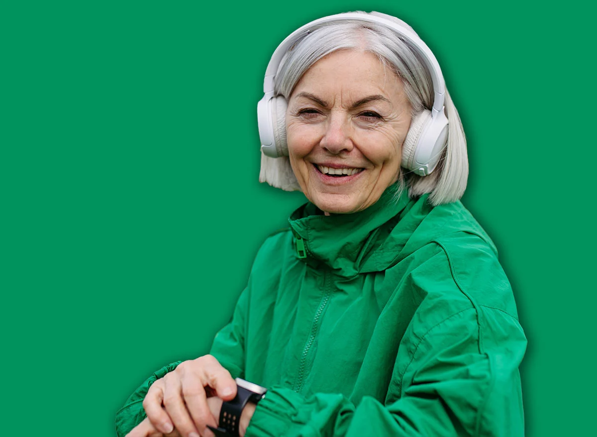 Mature,Woman,Checking,Her,Performance,On,Smartwatche,After,Run.,Exercising