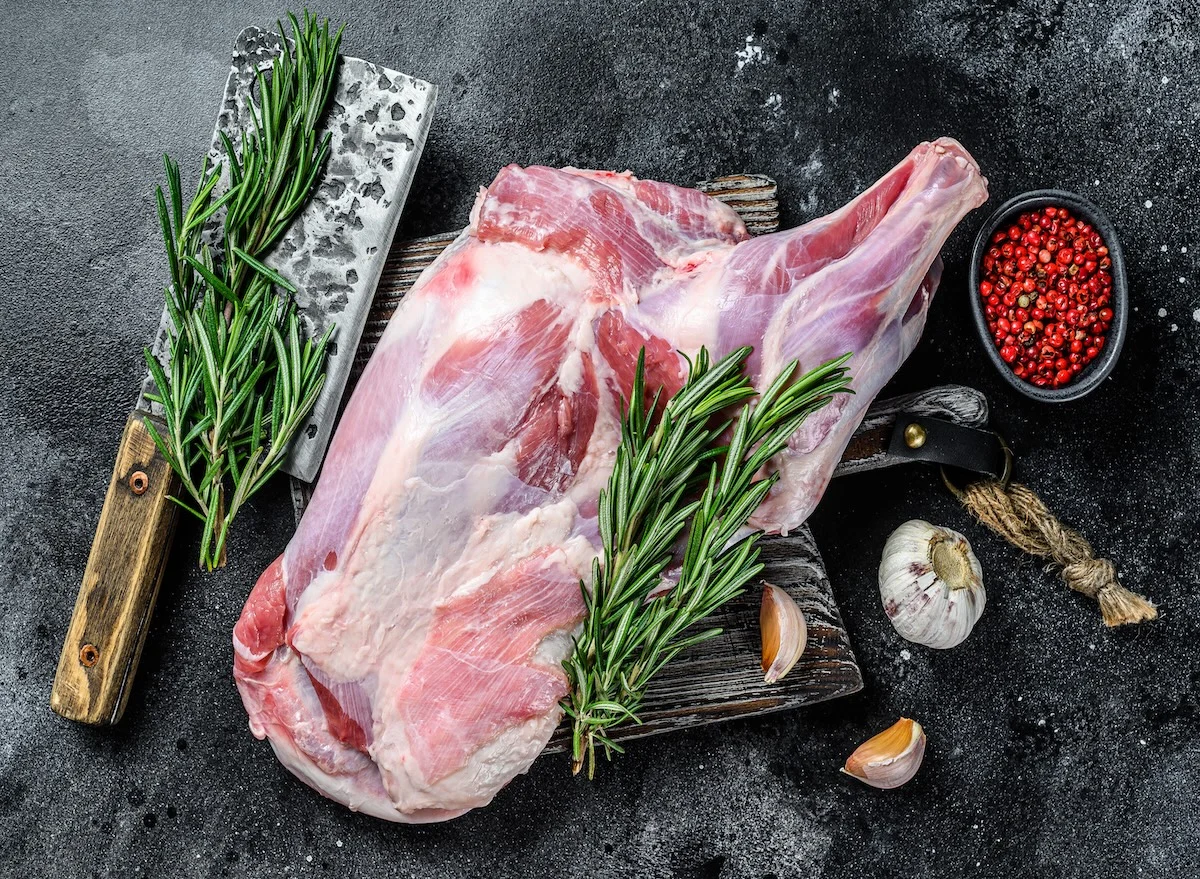 Raw,Lamb,Shoulder,Meat,Ready,For,Baking,With,Garlic,,Rosemary.