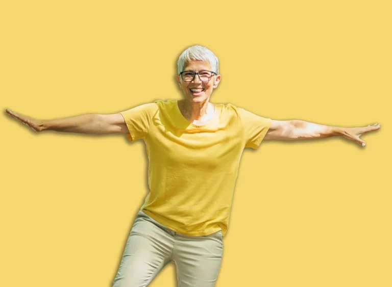 Balancing,Exercise,Outdoors.,Mature,Woman,Standing,On,One,Leg,,Exercising