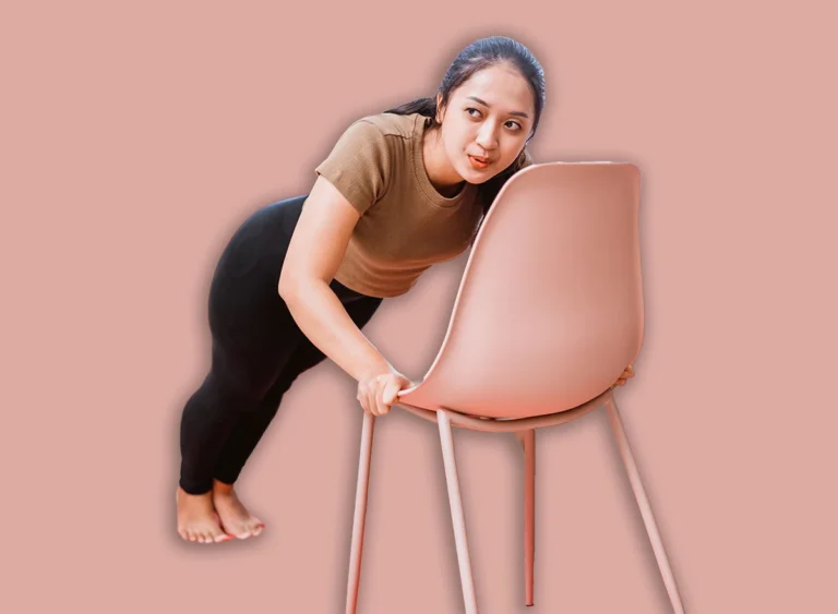 Modern,Young,Asian,Couple,Exercising,At,Home,Using,Chair,To