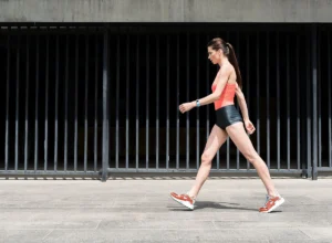 Slim,Sporty,Young,Girl,Walking,On,Street