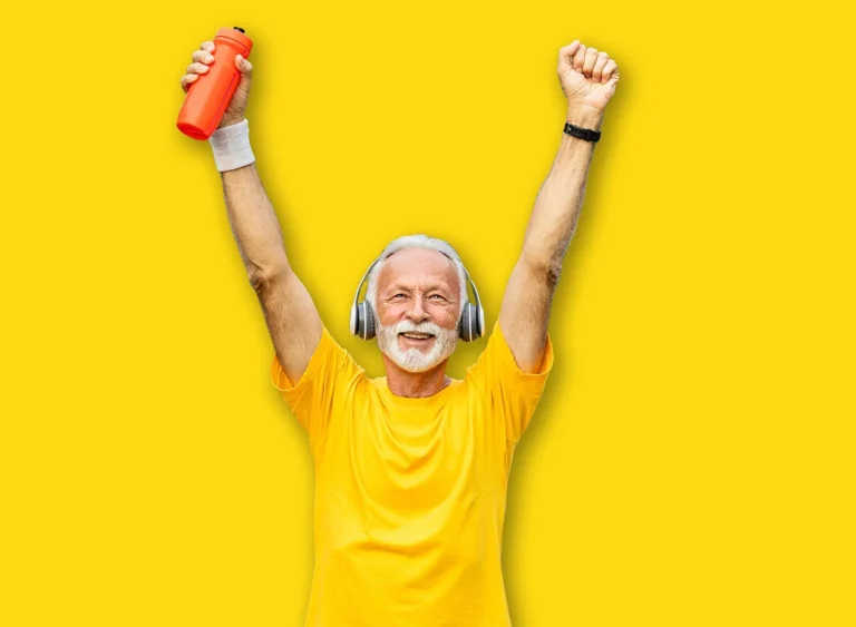 Senior,Runner,Holding,Hands,In,The,Air,Feeling,Happy,After