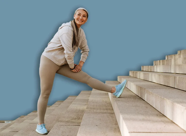 Asian,Mature,Woman,In,Tracksuit,Smiling,And,Doing,Workout,On