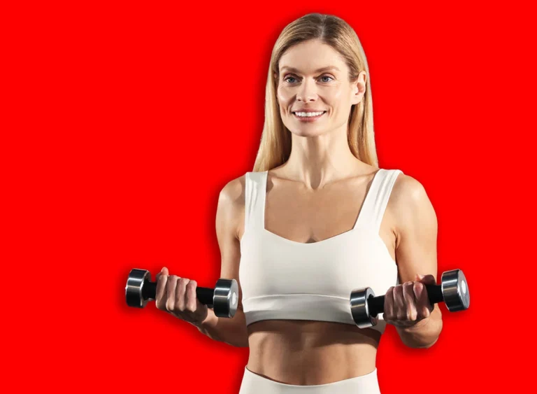 Woman,Training,With,Dumbbells,Near,Mirror,In,Gym