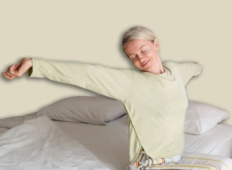 Smiling,Woman,Stretching,Arms,After,Sleep,In,Bed,At,Bedroom.
