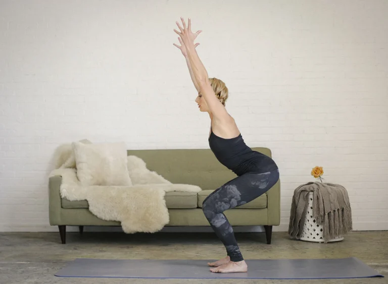 A,Blonde,Woman,In,A,Black,Leotard,And,Leggings,,Standing
