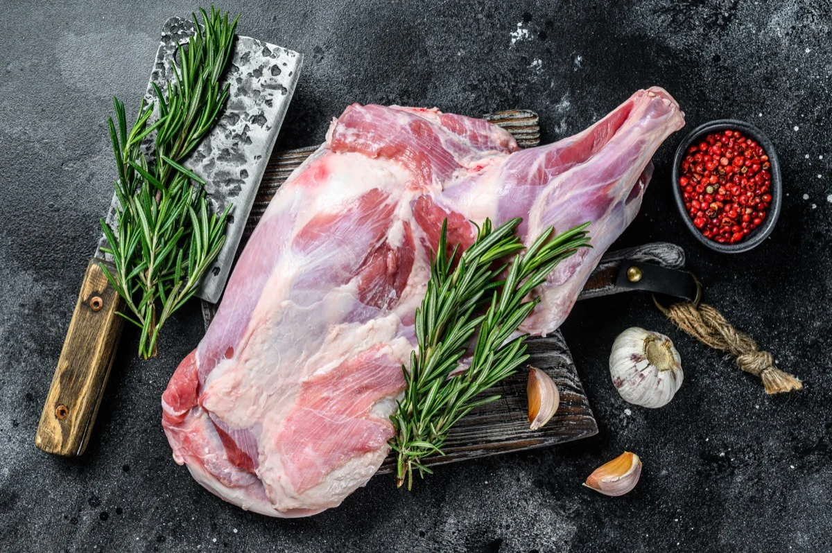 Raw,Lamb,Shoulder,Meat,Ready,For,Baking,With,Garlic,,Rosemary.