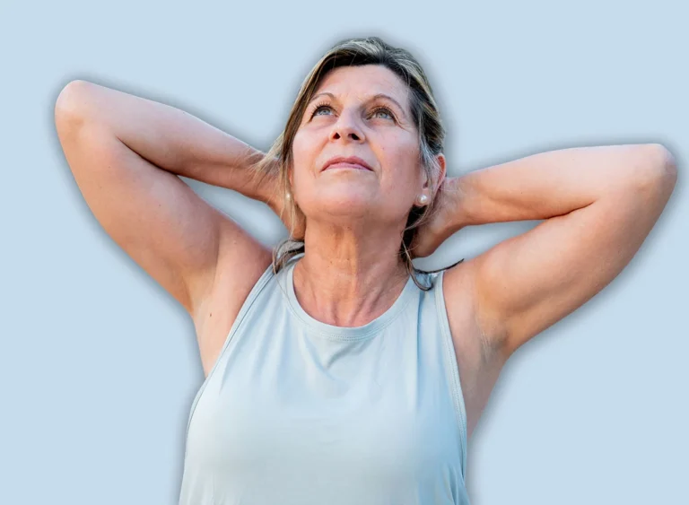 Senior,Woman,Stretching,Her,Neck,And,Looking,Up,,Enjoying,A