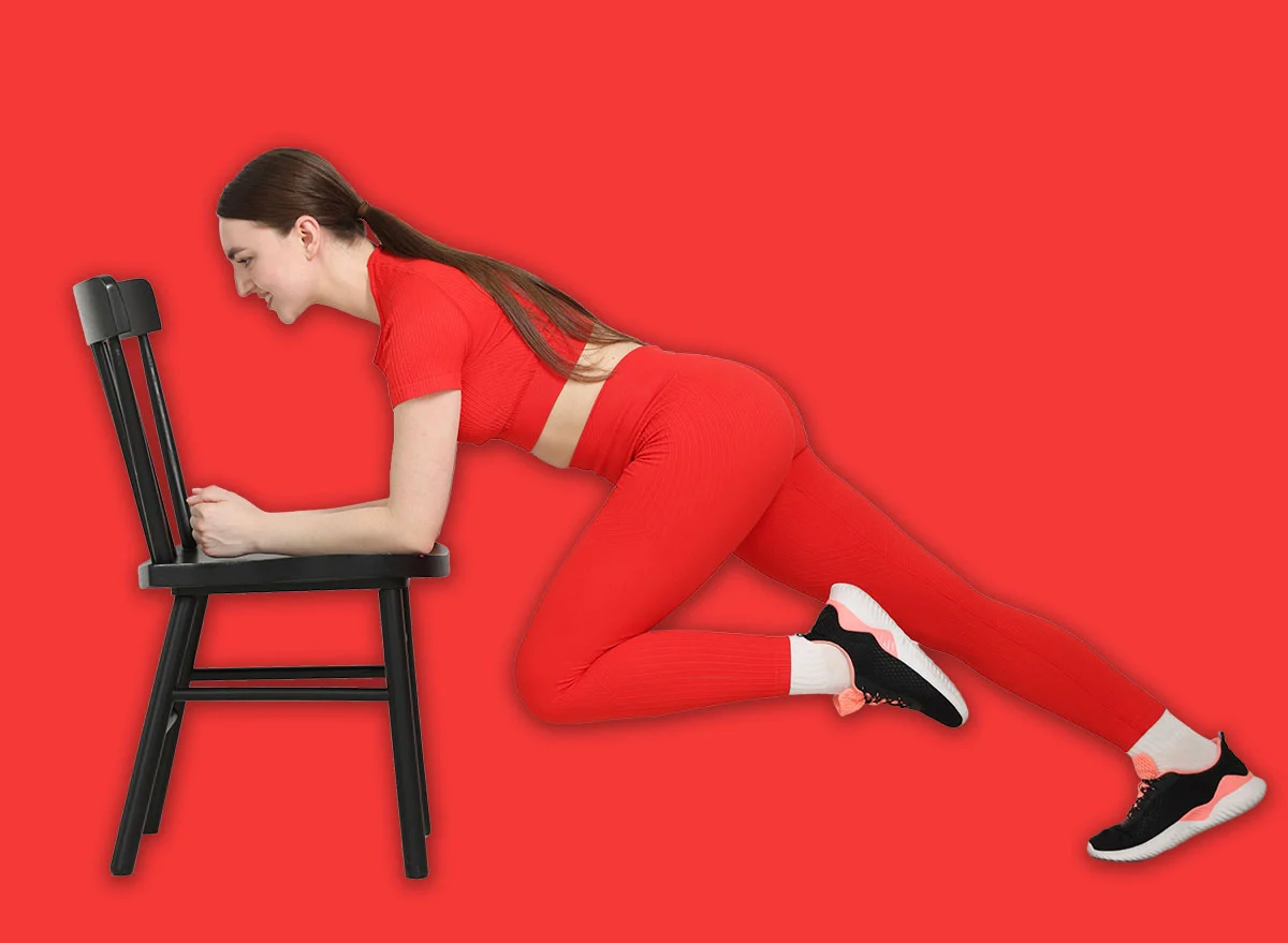 Beautiful,Woman,Exercising,With,Chair,At,Home